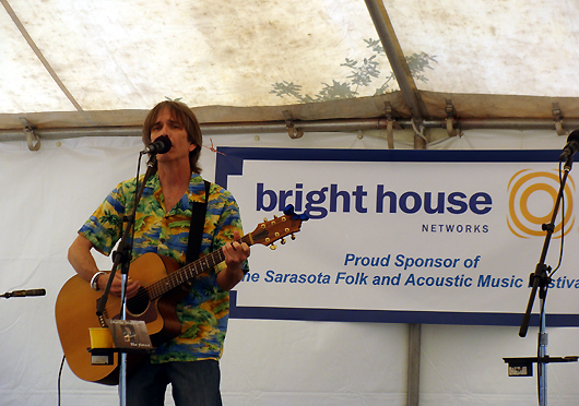 Charlie Morris on stage at the Sarasota Folk Festival