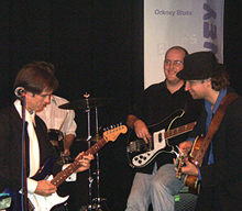 Ben of the Spikedrivers, on stage with the Charlie Morris Band