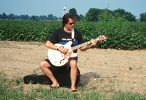 Chuck plays out in the cotton fields