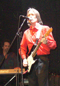 Charlie Morris - Guitar, Vocals - on stage at the Case a Chocs