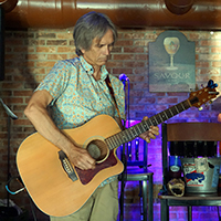Charlie Morris with acoustic guitar - color promo shot. Click on this thumbnail to view the high-resolution photo.